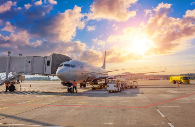 Aircraft at gate on airport apron
