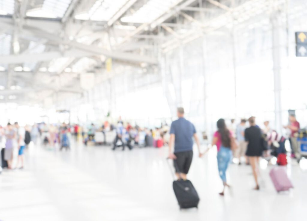 Customer Success Is a core principle at AeroCloud - image of busy airport terminal with blurred background